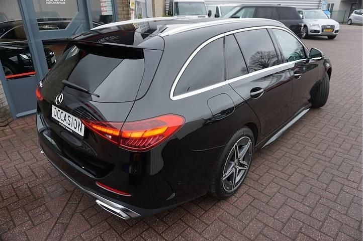 Occasion Mercedes C300 AMG line 2022 Zwart (metallic) Stationwagen