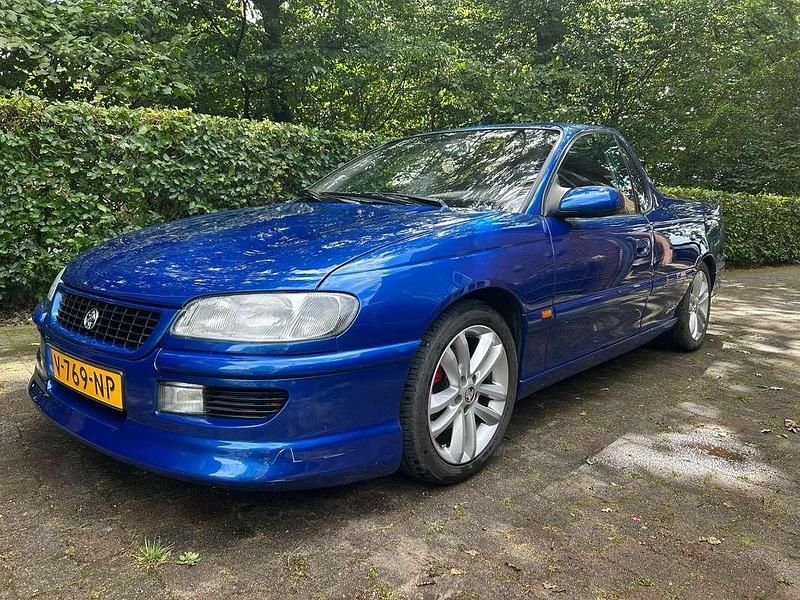 Occasion Opel Omega Basis 170 PK (125 kW) 1996 Blauw Pickup