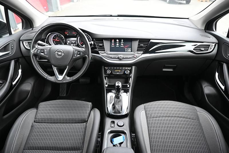 Occasion Opel Astra Business Elegance 146 PK (107 kW) 2022 Zwart (metallic) Stationwagen