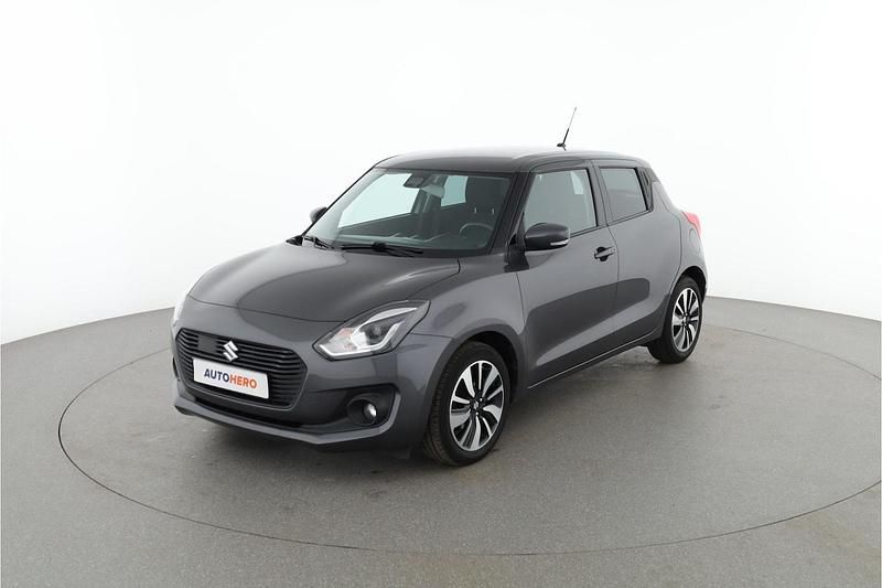 Grijs Gebruikt 2018 Suzuki Swift Comfort+ Hatchback | € 14.149 (Eerlijke prijs) - Afbeelding 1/4