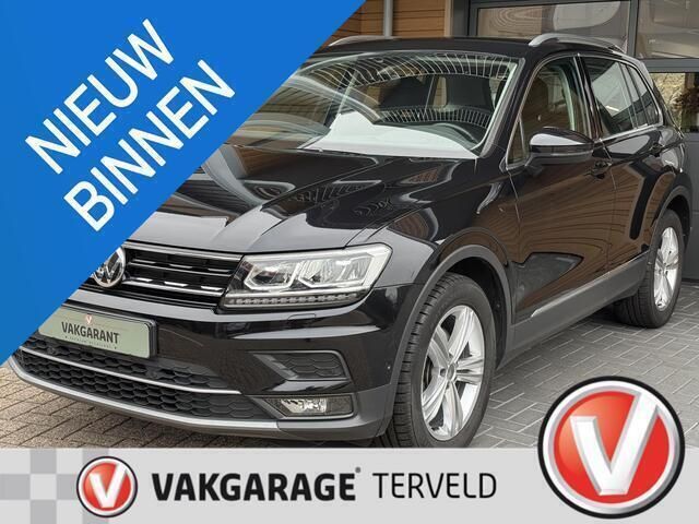 Zwart, metallic lak Gebruikt 2020 VW Tiguan Highline SUV | € 27.940 (Super prijs) - Afbeelding 1/4