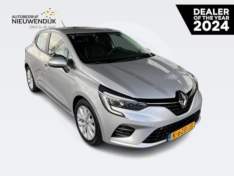 Licht platiniumgrijs d69 Gebruikt 2021 Renault Clio V Intens Hatchback | € 14.930 (Eerlijke prijs) - Afbeelding 1/4