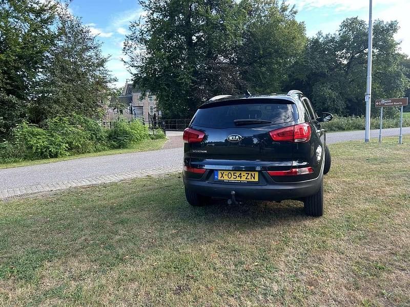 Zwart Gebruikt 2015 Kia Sportage SUV | € 13.500 (Eerlijke prijs) - Afbeelding 1/4