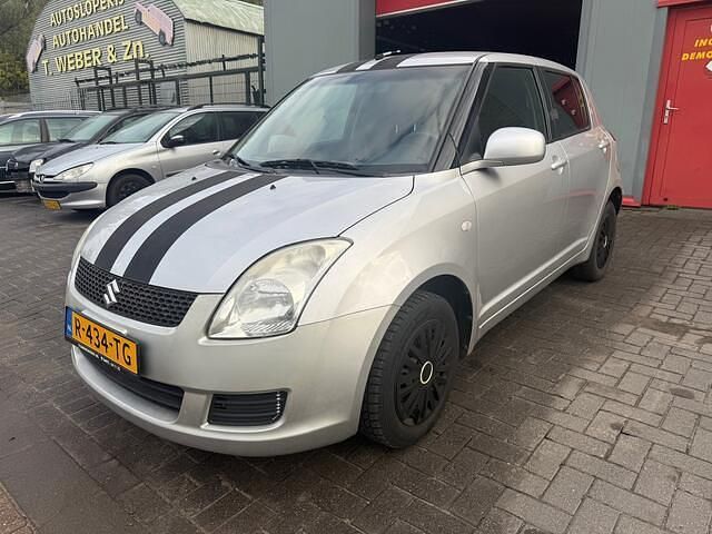 Grijs Gebruikt 2009 Suzuki Swift Hatchback | € 3.999 (Eerlijke prijs) - Afbeelding 1/4