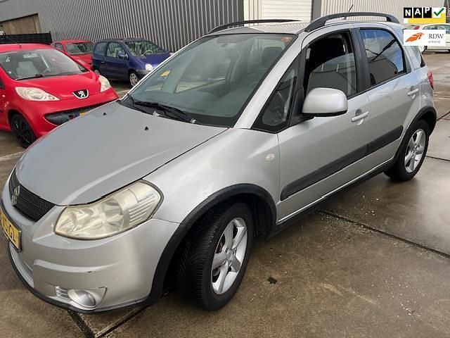 Grijs Gebruikt 2007 Suzuki SX4 MPV | € 2.999 (Eerlijke prijs) - Afbeelding 1/4
