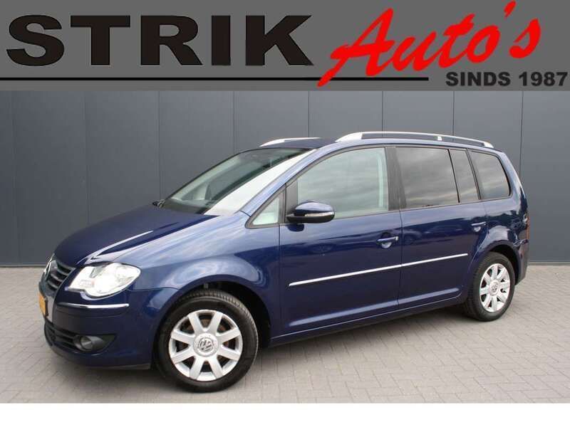 Blauw, metallic lak Gebruikt 2010 VW Touran Highline MPV | € 2.849 (Goede deal) - Afbeelding 1/4
