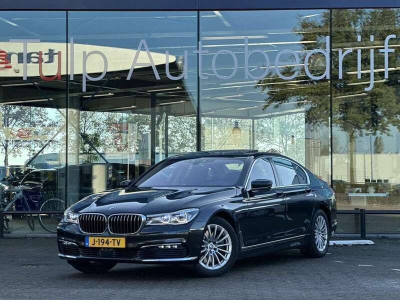 Grijs Gebruikt 2016 BMW 750 Executive Sedan | € 31.990 - Afbeelding 1/4