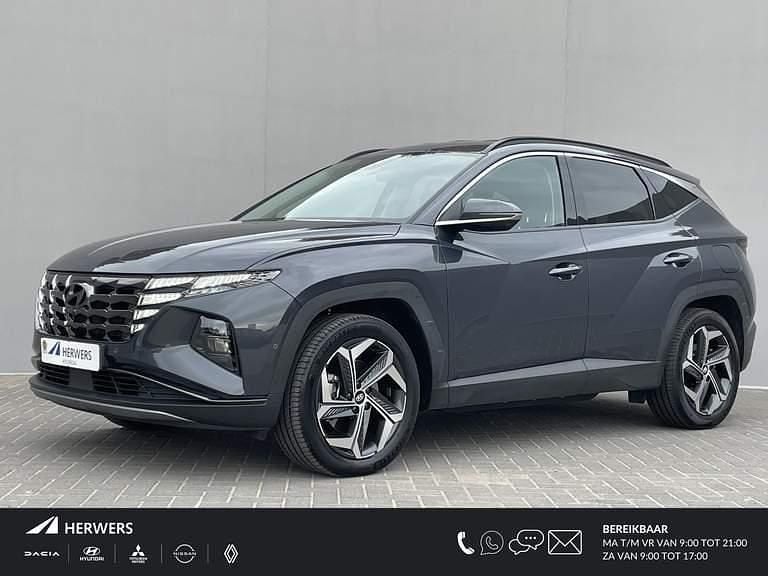 Dark knight pearl (yg7) Gebruikt 2022 Hyundai Tucson Premium SUV | € 32.835 (Eerlijke prijs) - Afbeelding 1/4