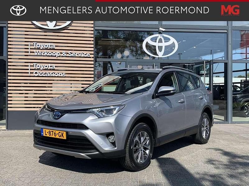 Grijs, metallic lak Gebruikt 2016 Toyota RAV4 Hybrid SUV | € 19.950 (Eerlijke prijs) - Afbeelding 1/4