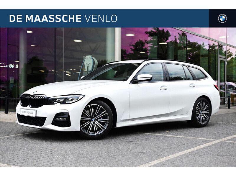 Wit, metallic lak Gebruikt 2019 BMW 330 Executive Stationwagen | € 33.950 (Iets duurder) - Afbeelding 1/4