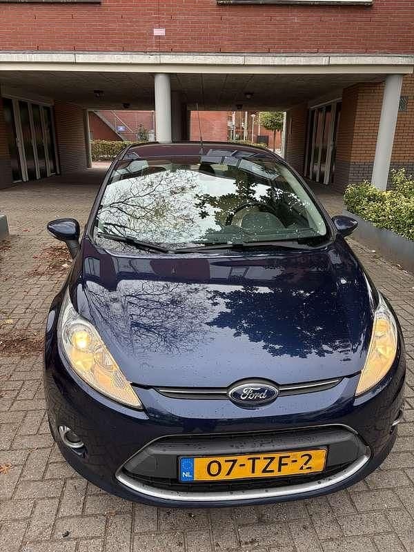 Blauw Gebruikt 2012 Ford Fiesta Titanium Hatchback | € 2.500 (Goede deal) - Afbeelding 1/4