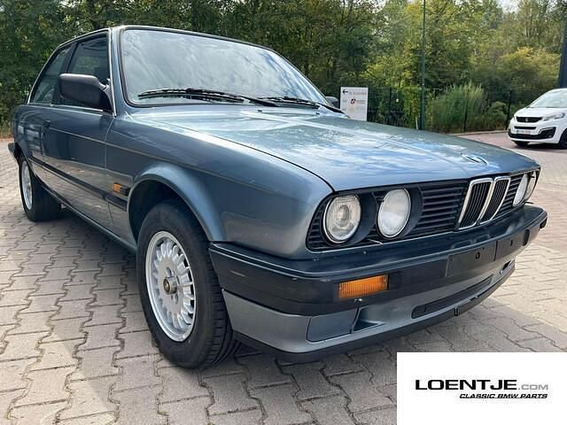 Blauw Gebruikt 1988 BMW 320 Sedan | € 10.950 - Afbeelding 1/4