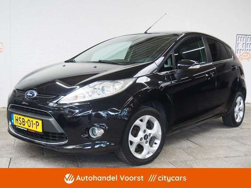 Zwart, metallic lak Gebruikt 2010 Ford Fiesta Titanium Hatchback | € 6.445 (Iets duurder) - Afbeelding 1/4