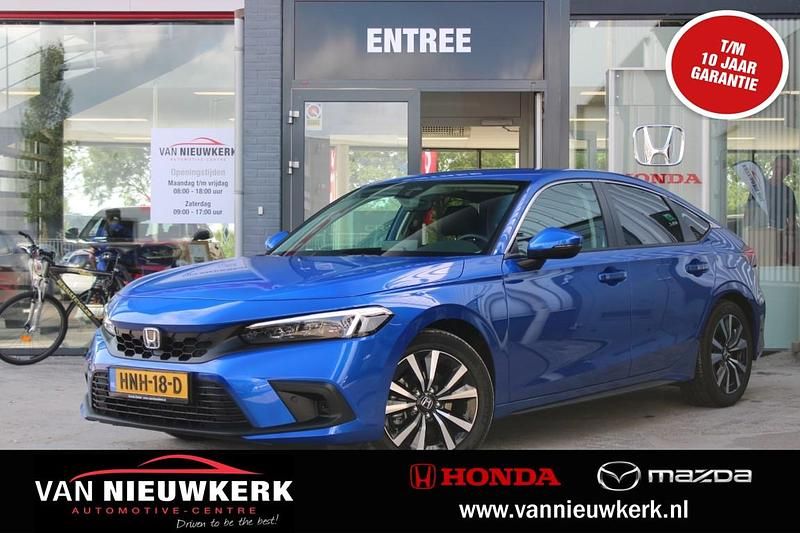 Blauw Gebruikt 2025 Honda Civic Elegance Hatchback | € 33.700 (Goede deal) - Afbeelding 1/4