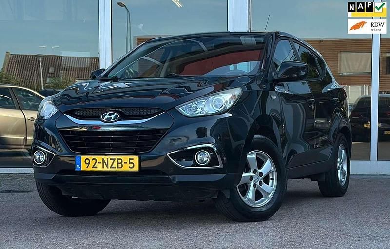 Zwart Gebruikt 2011 Hyundai ix35 Dynamiq SUV | € 7.944 (Eerlijke prijs) - Afbeelding 1/3