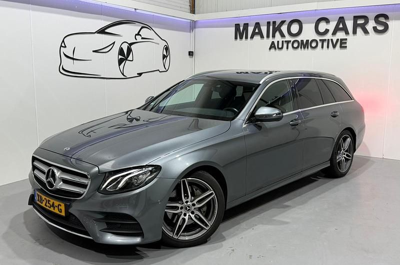 Grijs Gebruikt 2018 Mercedes E200 AMG line Stationwagen | € 27.995 (Eerlijke prijs) - Afbeelding 1/4