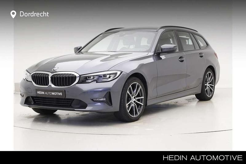 Grijs Gebruikt 2020 BMW 320 Executive Stationwagen | € 24.895 (Goede deal) - Afbeelding 1/3