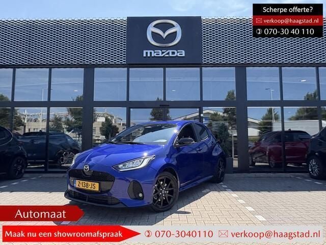 Glass blue metallic Gebruikt 2024 Mazda 2 Homura-Line Hatchback | € 25.750 (Eerlijke prijs) - Afbeelding 1/4