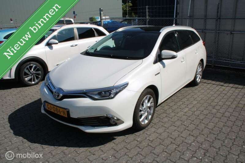 Wit, metallic lak Gebruikt 2015 Toyota Auris Hybrid Comfort Hatchback | € 11.250 (Eerlijke prijs) - Afbeelding 1/4
