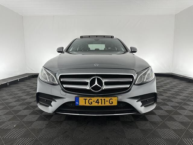 Occasion Mercedes E220 AMG line 194 PK (142 kW) 2018 Selenite gray metallic (grijs metallic) Sedan
