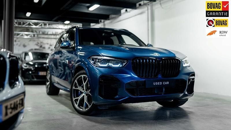 Blauw Gebruikt 2022 BMW X5 Executive SUV | € 63.950 (Super prijs) - Afbeelding 1/4