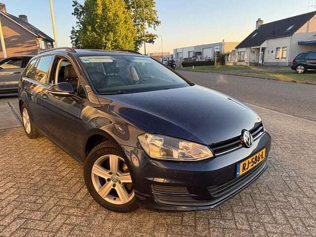 Blauw Gebruikt 2014 VW Golf VII Highline Stationwagen | € 5.499 (Goede deal) - Afbeelding 1/4