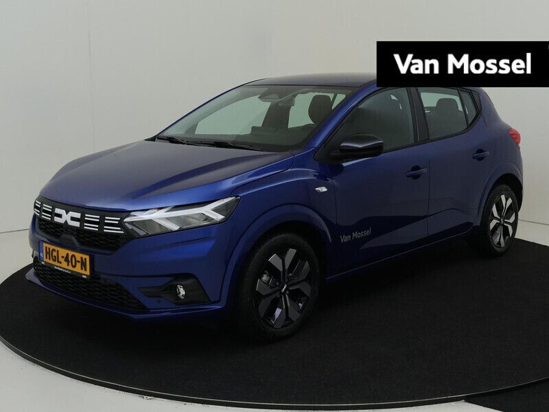 Blauw, metallic lak Gebruikt 2025 Dacia Sandero Journey Hatchback | € 23.935 (Iets duurder) - Afbeelding 1/4