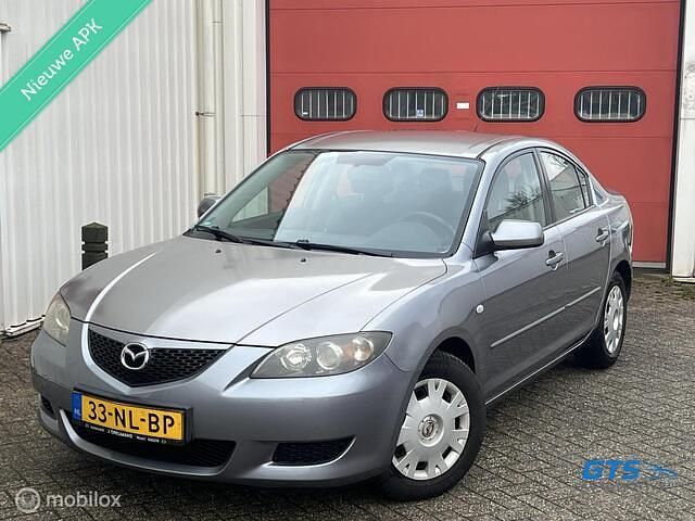 Grijs (metallic) Gebruikt 2003 Mazda 3 Touring Sedan | € 2.950 (Iets duurder) - Afbeelding 1/4