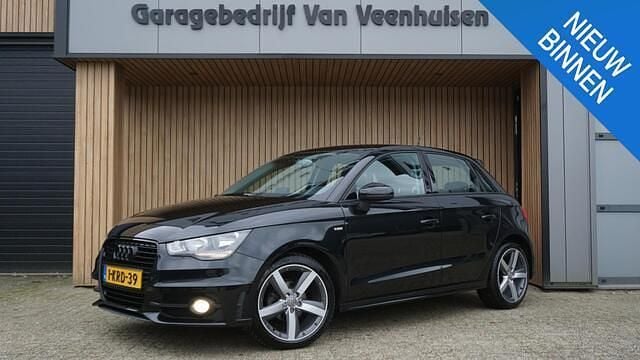 Zwart Gebruikt 2013 Audi A1 Sportback Admired Hatchback | € 11.950 (Eerlijke prijs) - Afbeelding 1/4