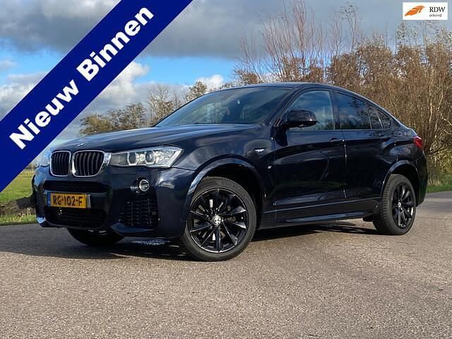 Zwart Gebruikt 2016 BMW X4 Executive SUV | € 21.950 (Eerlijke prijs) - Afbeelding 1/4