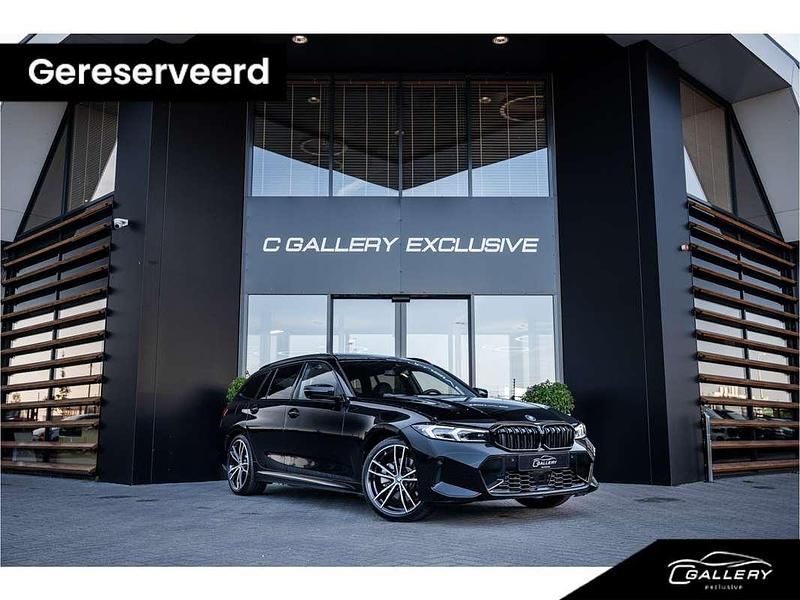 Zwart, metallic lak Gebruikt 2024 BMW 330 M Sport Stationwagen | € 51.495 (Iets duurder) - Afbeelding 1/4