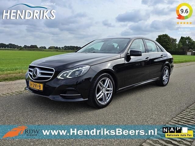 Zwart (metallic) Gebruikt 2014 Mercedes E250 Avantgarde Sedan | € 16.949 - Afbeelding 1/4