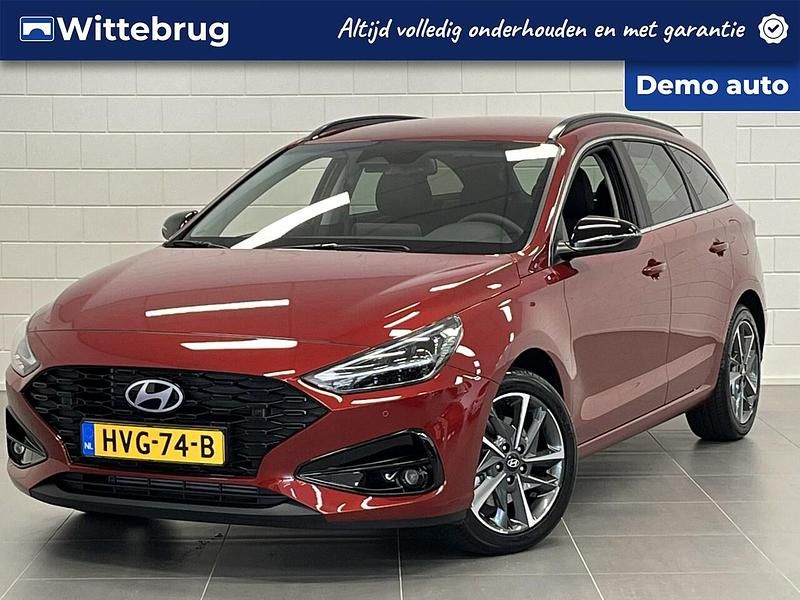 Rood metallic Gebruikt 2025 Hyundai i30 Premium Stationwagen | € 38.925 - Afbeelding 1/3