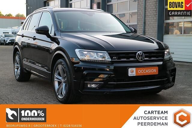 Zwart Gebruikt 2018 VW Tiguan R-line SUV | € 24.995 (Eerlijke prijs) - Afbeelding 1/4