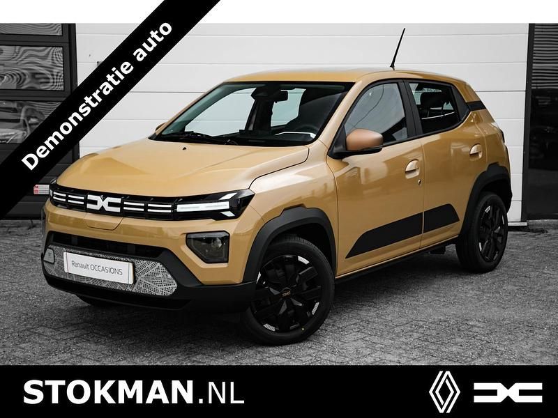 Bruin (metallic) Gebruikt 2024 Dacia Spring Extreme Hatchback | € 18.900 (Iets duurder) - Afbeelding 1/4