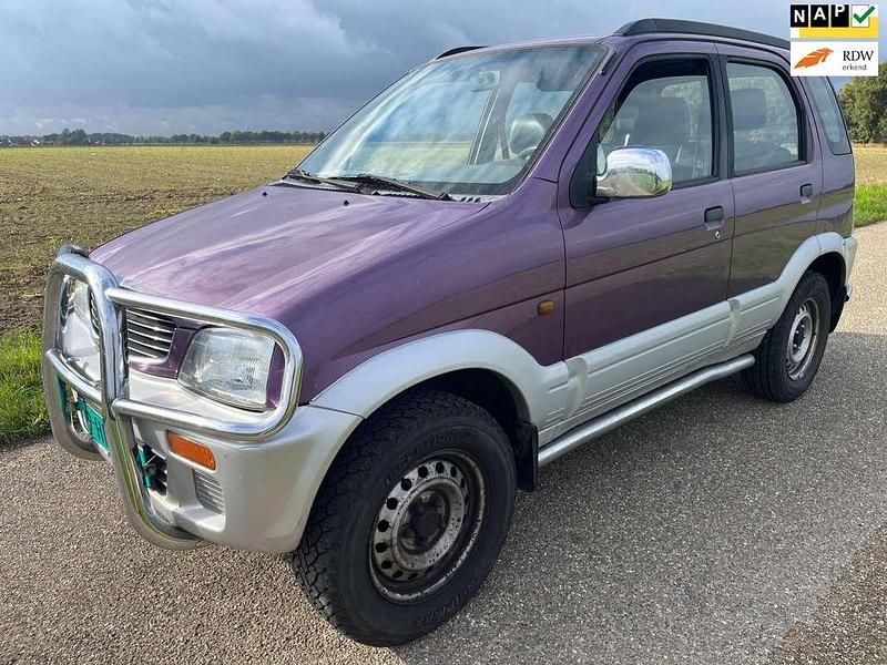 Paars Gebruikt 1998 Daihatsu Terios SUV | € 2.000 (Eerlijke prijs) - Afbeelding 1/4