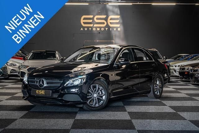 Zwart Gebruikt 2016 Mercedes C180 Prestige Sedan | € 19.495 (Eerlijke prijs) - Afbeelding 1/4