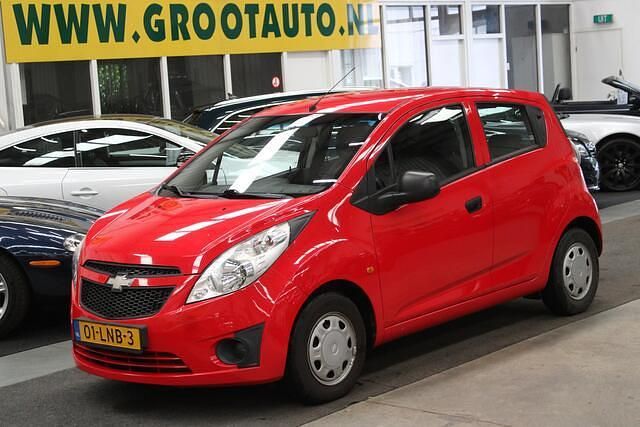 Rood Gebruikt 2010 Chevrolet Spark LS Hatchback | € 2.744 (Goede deal) - Afbeelding 1/4
