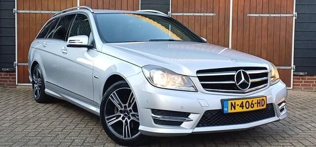 Grijs Occasion 2014 Mercedes C180 AMG line Stationwagen | € 9.950 (Eerlijke prijs) - Afbeelding 1/4