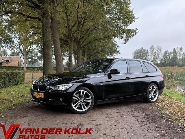 Zwart Gebruikt 2013 BMW 330 Executive Stationwagen | € 13.885 - Afbeelding 1/4