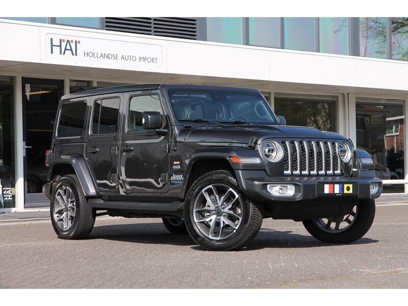 Grijs Occasion 2022 Jeep Wrangler Unlimited Sahara SUV | € 64.800 (Eerlijke prijs) - Afbeelding 1/4