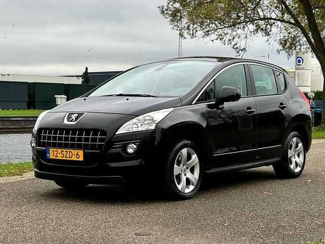 Zwart (metallic) Gebruikt 2012 Peugeot 3008 MPV | € 3.950 (Eerlijke prijs) - Afbeelding 1/4