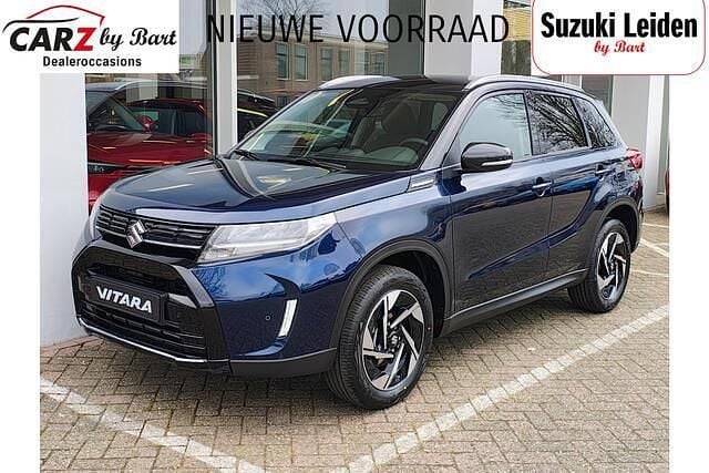 Blauw Nieuw 2025 Suzuki Vitara Style SUV | € 37.379 (Eerlijke prijs) - Afbeelding 1/4