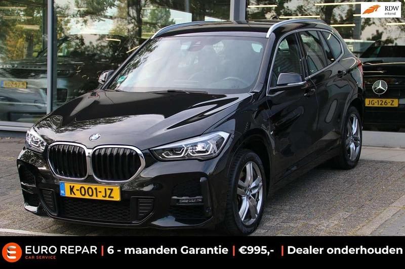 Zwart Gebruikt 2021 BMW X1 M Sport SUV | € 25.995 (Eerlijke prijs) - Afbeelding 1/4