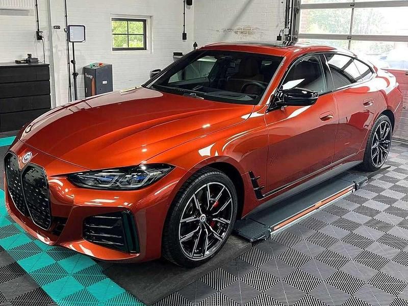 Oranje Gebruikt 2022 BMW i4 Sedan | € 50.950 (Eerlijke prijs) - Afbeelding 1/4