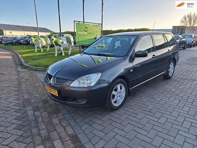 Grijs Occasion 2004 Mitsubishi Lancer Comfort Edition Stationwagen | € 1.699 - Afbeelding 1/4