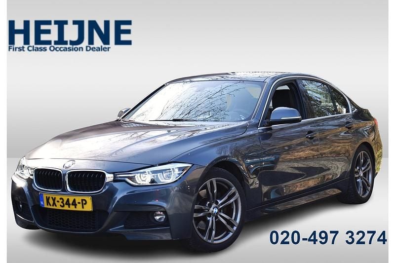 Grijs Gebruikt 2016 BMW 330e Executive Sedan | € 16.745 (Eerlijke prijs) - Afbeelding 1/4