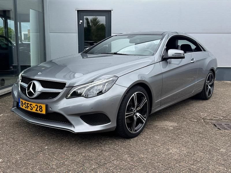 Grijs Gebruikt 2013 Mercedes E200 Coupé | € 18.950 (Eerlijke prijs) - Afbeelding 1/4