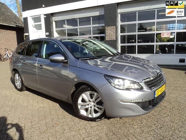 Grijs Gebruikt 2015 Peugeot 308 Stationwagen | € 4.500 (Goede deal) - Afbeelding 1/3