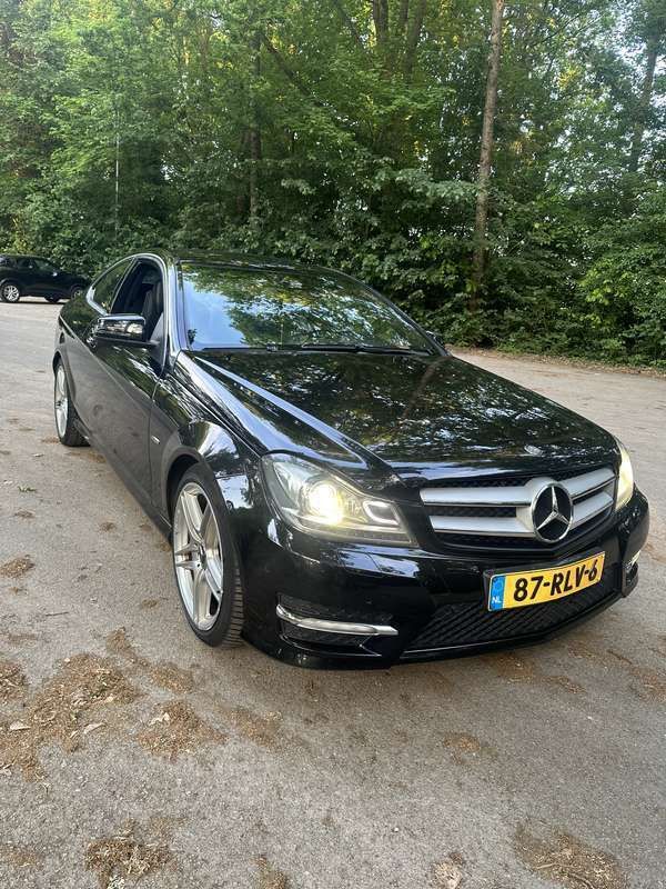 Zwart Gebruikt 2011 Mercedes C180 AMG Coupé | € 8.500 (Eerlijke prijs) - Afbeelding 1/4